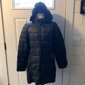 Water repellent jacket, soft, detachable hood side pockets & storage pouch